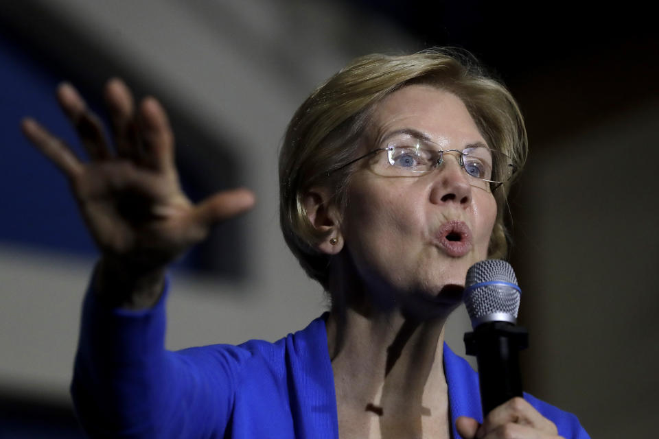 FILE - In this Nov. 11, 2019 file photo, Democratic presidential candidate Sen. Elizabeth Warren, D-Mass., addresses an audience during a campaign event in Exeter, N.H.  Warren’s proposed wealth tax is putting her at odds with some of Wall Street’s wealthiest, and the fight is increasingly spilling out into the open. In an interview on business new channel CNBC Thursday, Nov. 14, billionaire investor Leon Cooperman said Warren’s plan to impose a new tax on the nation’s richest people would “penalize success” and that a Warren presidency would mean “big trouble” for Wall Street and the country. (AP Photo/Steven Senne, File)