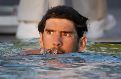 Michael Phelps hopes to qualify for his fourth Olympics. (AP)