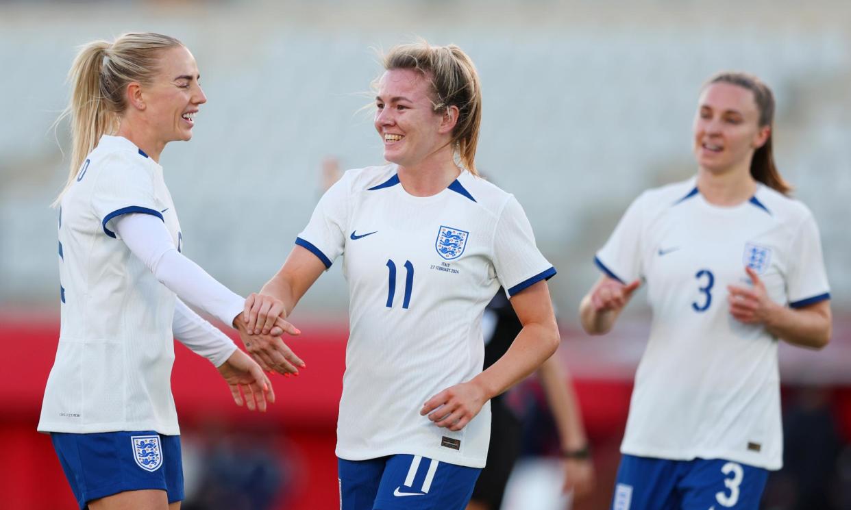 <span>Lauren Hemp (No 11) is congratulated by Alex Greenwood after her second goal puts England 3-0 ahead.</span><span>Photograph: Fran Santiago/The FA/Getty Images</span>