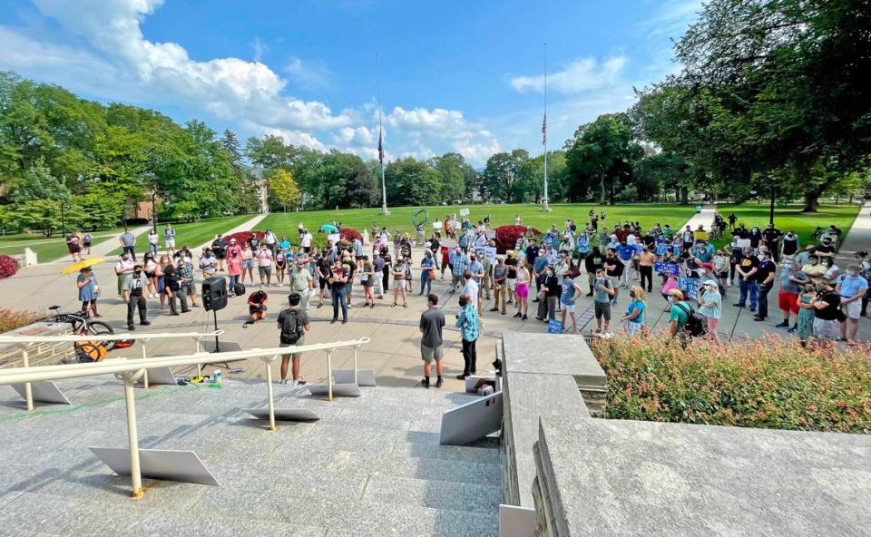 About 150 people attended a rally in August at Old Main to call on Penn State to require a COVID-19 mandate for students and staff.