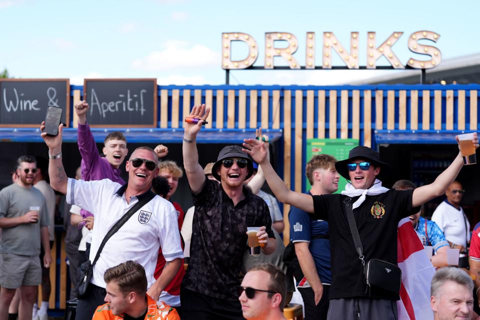 England fans enjoy a drink in Berlin (PA Wire)