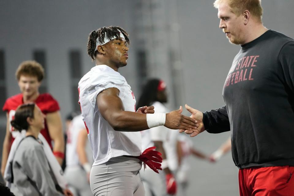 Mar 5, 2024; Columbus, OH, USA; Ohio State Buckeyes safety Caleb Downs (2) stretches during the first spring practice at the Woody Hayes Athletic Center.