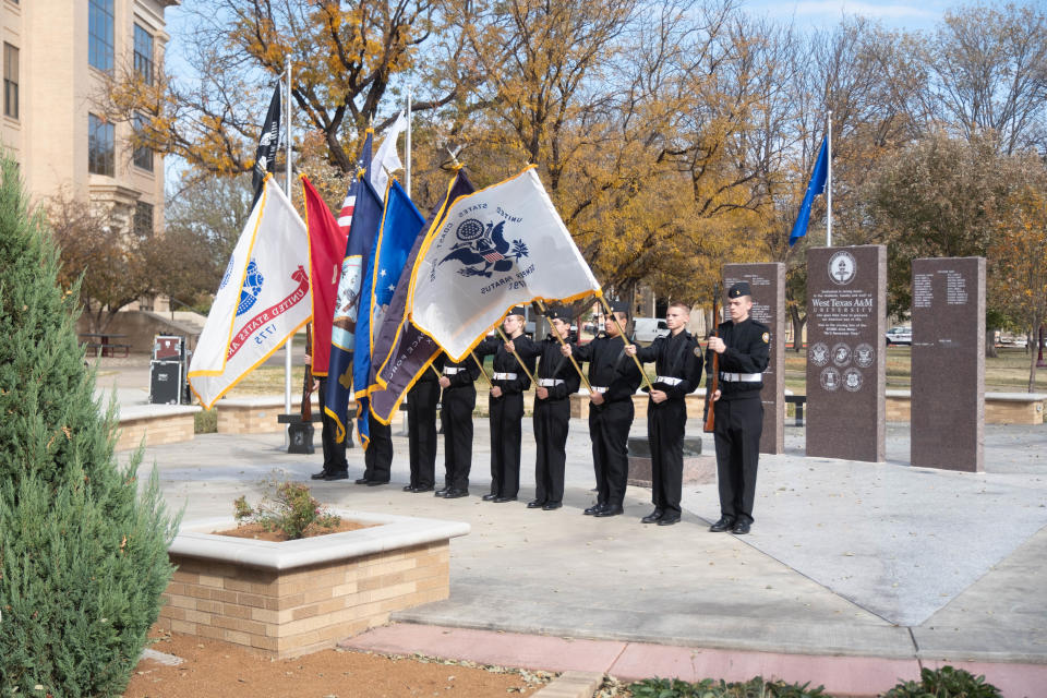 The Tascosa High School Navy JROTC Color Guard presents the colors at a community veterans ceremony Friday at West Texas A&M University in Canyon.