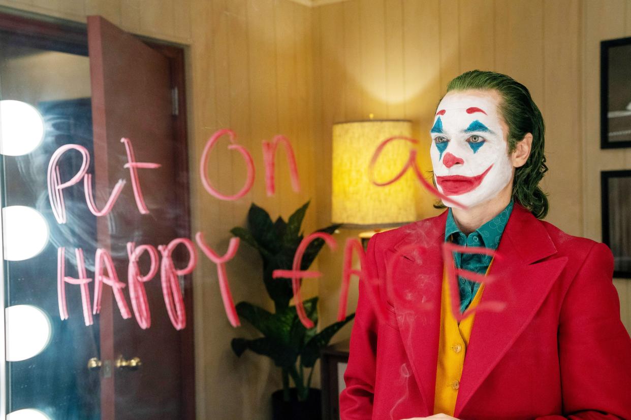 Joaquin Phoenix makes his transformation into the Clown Prince of Crime in 'Joker' (Photo: Niko Tavernise / © Warner Bros. / courtesy Everett Collection)