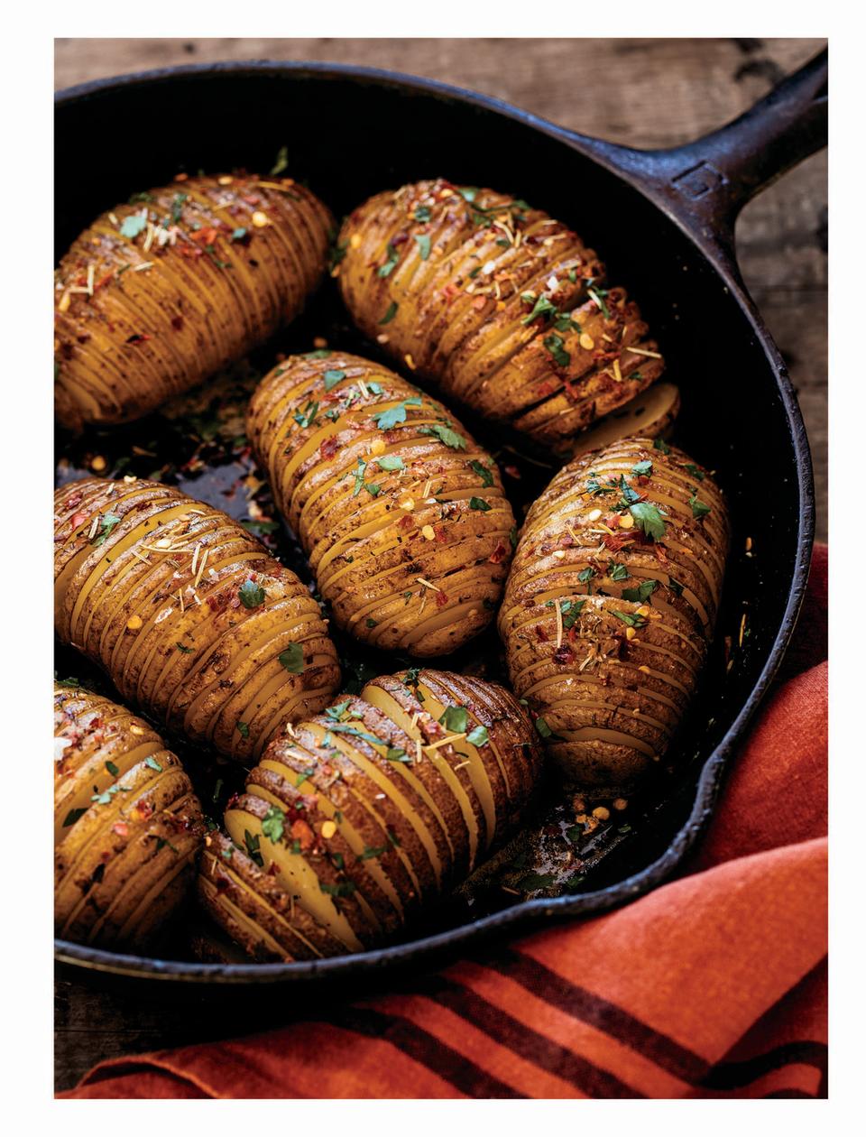 <p>These perfectly spiced, heavily buttered, evenly cut potatoes are elegant, delicious, and easy to make. What more could you want? </p><p><strong><a href="https://www.countryliving.com/food-drinks/a34277029/cast-iron-hasselback-potatoes/" rel="nofollow noopener" target="_blank" data-ylk="slk:Get the recipe;elm:context_link;itc:0;sec:content-canvas" class="link ">Get the recipe</a>.</strong></p><p><a class="link " href="https://www.amazon.com/Victoria-Skillet-Seasoned-Flaxseed-Certified/dp/B01726HD72/?tag=syn-yahoo-20&ascsubtag=%5Bartid%7C10050.g.34470406%5Bsrc%7Cyahoo-us" rel="nofollow noopener" target="_blank" data-ylk="slk:SHOP CAST IRON SKILLETS;elm:context_link;itc:0;sec:content-canvas">SHOP CAST IRON SKILLETS</a></p>