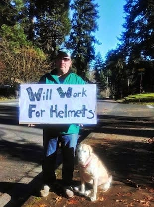 North Marion football coach Doug Bilodeau and his dog Sally will work for new helmets — Facebook