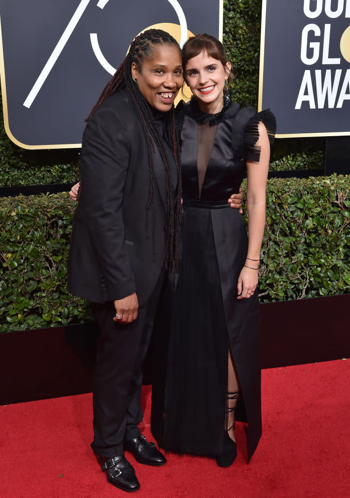 Activist Marai Larasi and Emma Watson attend the Golden Globe Awards on Jan. 7, 2018 in Beverly Hills, Calif. (Photo: Axelle/Bauer-Griffin/FilmMagic)