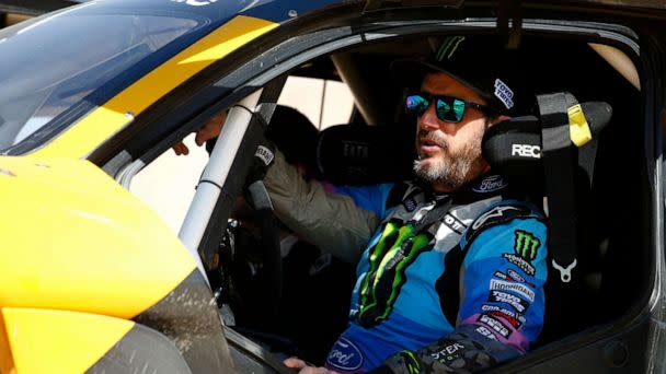 PHOTO: (FILES) In this file photo taken on January 17, 2020, legendary off-road racer and YouTube star Ken Block prepares to take the wheel of Extreme Es E-SUV to take part in the Grand Prix of Qiddiya finale of the Dakar 2020. (Franck Fife/AFP via Getty Images)