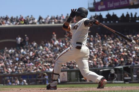 Jun 20, 2018; San Francisco, CA, USA; San Francisco Giants left fielder Gorkys Hernandez (7) hits an rbi single during the sixth inning of the game against the Miami Marlins at AT&T Park. Mandatory Credit: Ed Szczepanski-USA TODAY Sports