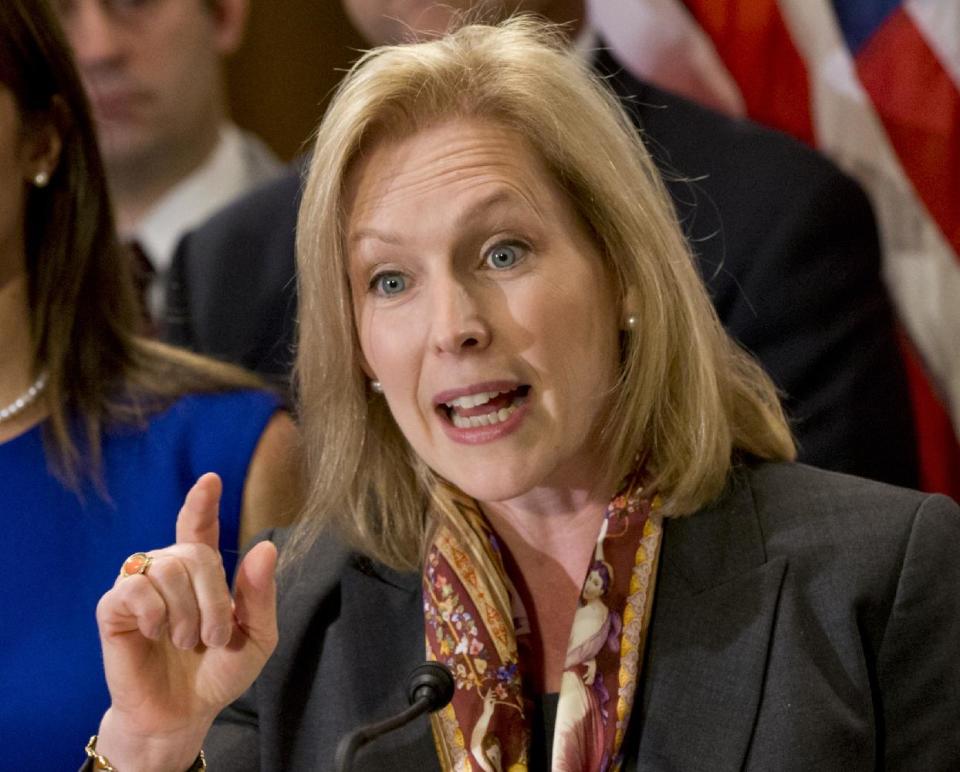 FILE - In this Nov. 19, 2013 file photo, Sen. Kirsten Gillibrand, D-N.Y. speaks on Capitol Hill in Washington. The Senate’s record-setting 20 women, emboldened by their recent political and legislative successes, are determined to swell their ranks this November. They’re providing campaign and fundraising help to the Republican and Democratic female candidates from West Virginia, Kentucky, Georgia and Oregon looking to smash a few glass ceilings, and hopefuls from Michigan and Hawaii eyeing an all-female Senate lineup. (AP Photo/J. Scott Applewhite, File)