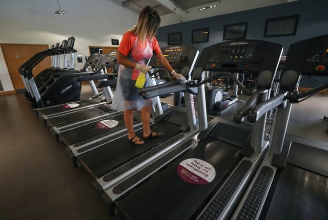 Gym equipment is cleaned prior to reopening