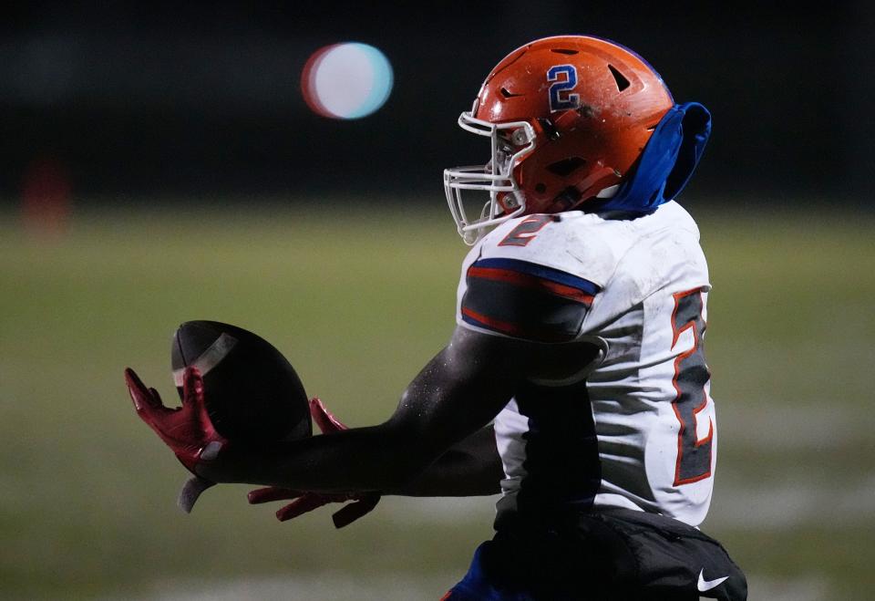 Palm Beach Gardens’ Keyon Stephens intercepts a pass in the second half of the 4M Regional Final against Palm Beach Central on Nov. 25 in Wellington.