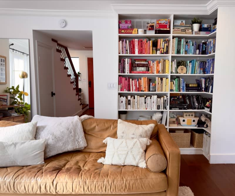 <span>Emily Raciti, her husband, Evan, and their 1-year-old daughter, Mila, have owned this three-bedroom townhome for two years. They've DIYed a lot of things in the home, like these built-from-scratch bookshelves. Credit: Emily Raciti</span> <span class="copyright">Credit: Emily Raciti</span>