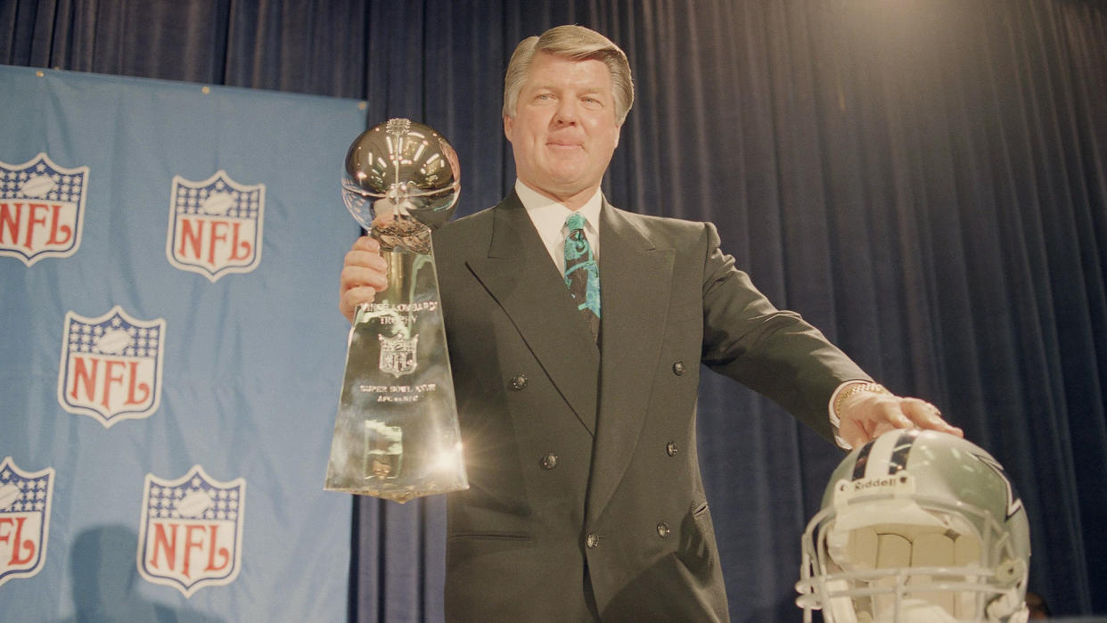 Mandatory Credit: Photo by Susan Walsh/AP/Shutterstock (6546028a)Jimmy Johnson Dallas Cowboys coach Jimmy Johnson holds up the Super Bowl trophy following a news conference at Atlanta onDallas Cowboy Coach Jimmy Johnson Holding Trophy, Atlanta, USA.