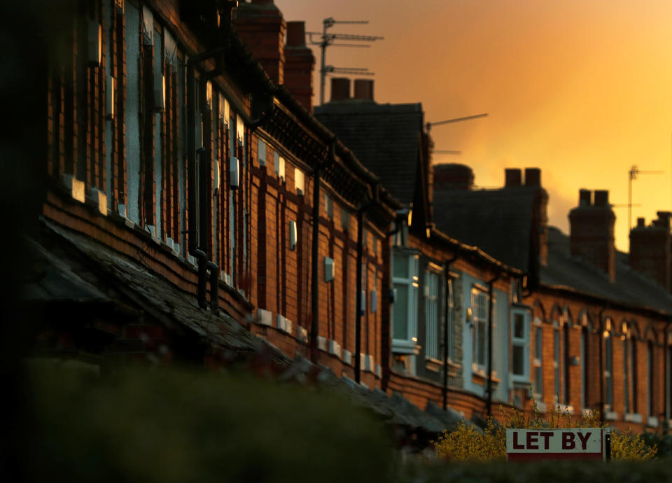 An estate agents sign for a house to rent