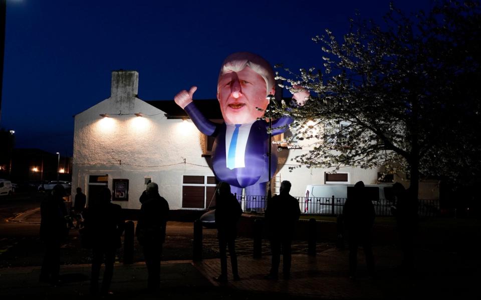 A 30ft inflatable Boris Johnson erected outside Mill House Leisure Centre  -  PA