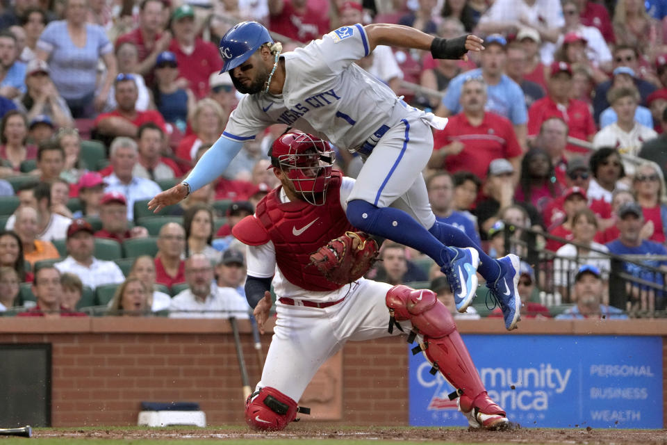 Kansas City Royals' MJ Melendez (1) is out at home as he tries unsuccessfully to avoid the tag from St. Louis Cardinals catcher Willson Contreras during the fourth inning of a baseball game Tuesday, May 30, 2023, in St. Louis. (AP Photo/Jeff Roberson)