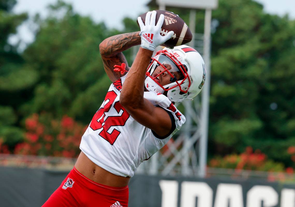 N.C. State wide receiver Terrell Timmons Jr. (82) pulls in the pass during the Wolfpack’s first fall practice in Raleigh, N.C., Wednesday, August 2, 2023. Ethan Hyman/ehyman@newsobserver.com