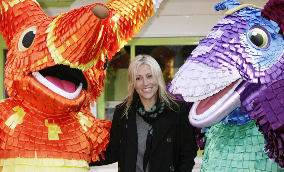 Nicole Appleton poses with characters from the video game Viva Pinata during the launch of the Xbox 360 Gaming Zone at Legoland, in Windsor.