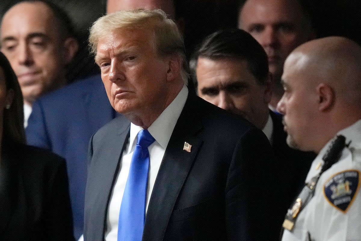 Donald Trump leaves a criminal courtroom in Manhattan on May 30 after he was found guilty of 34 counts of falsifying business records. (AP)