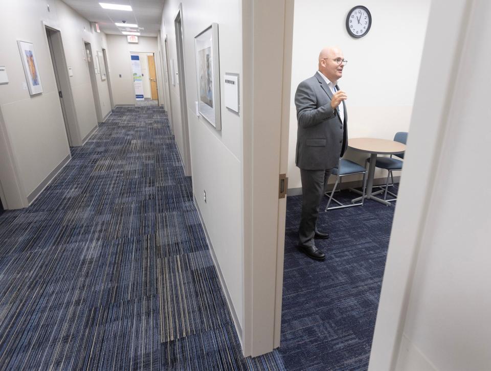 Doug Straight, director of Akron Children's behavioral health service line, talks about one of the individual interview rooms at the new Canton facility.