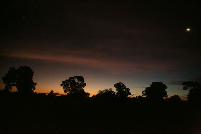 <p>Carmen Campos</p> Sundown at Caiman, an ecological reserve in Brazil's Pantanal wetlands.