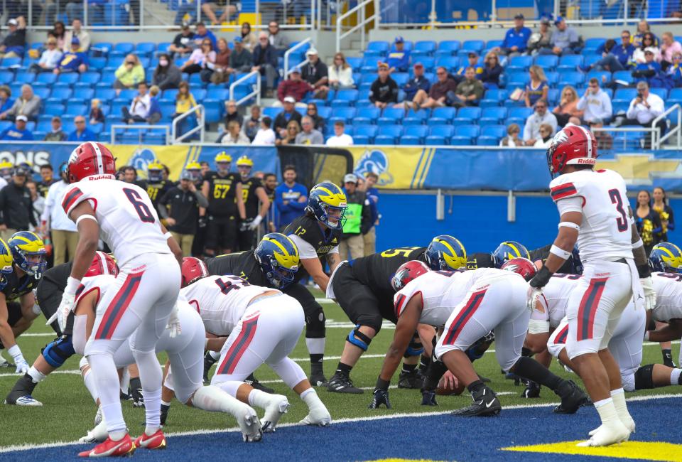 Delaware quarterback Zach Gwynn lines up at center as part of the 8,391 fans in attendance watch in the second quarter at Delaware Stadium Saturday, Oct. 30, 2021.