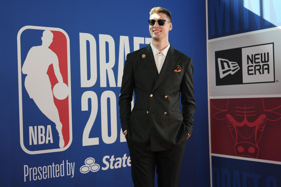 Kyle Filipowski walks the red carpet before the NBA basketball draft, Wednesday, June 26, 2024, in New York. (AP Photo/Julia Nikhinson)