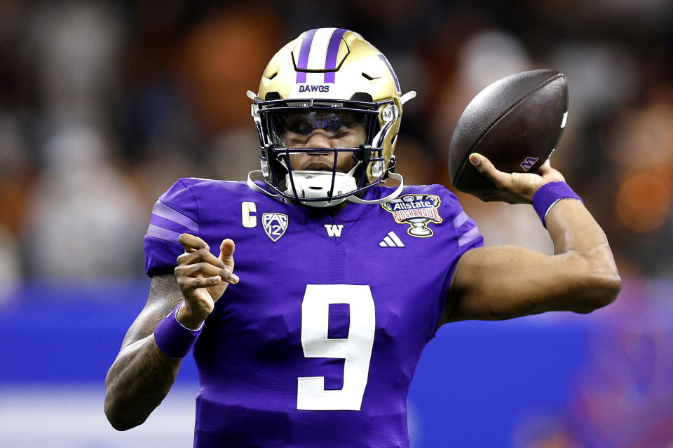 NEW ORLEANS, LOUISIANA - JANUARY 01: Michael Penix Jr. #9 of the Washington Huskies warms up prior to a game against the Texas Longhorns during the CFP Semifinal Allstate Sugar Bowl at Caesars Superdome on January 01, 2024 in New Orleans, Louisiana. (Photo by Sean Gardner/Getty Images)