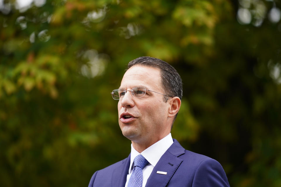 Pennsylvania Attorney General Josh Shapiro speaks with members of the media after a news conference at Marsh Creek State Park in Downingtown, Pa., Tuesday, Oct. 5, 2021. Shapiro filed criminal charges Tuesday against the developer of a problem-plagued pipeline that takes natural gas liquids from the Marcellus Shale gas field to an export terminal near Philadelphia. (AP Photo/Matt Rourke)