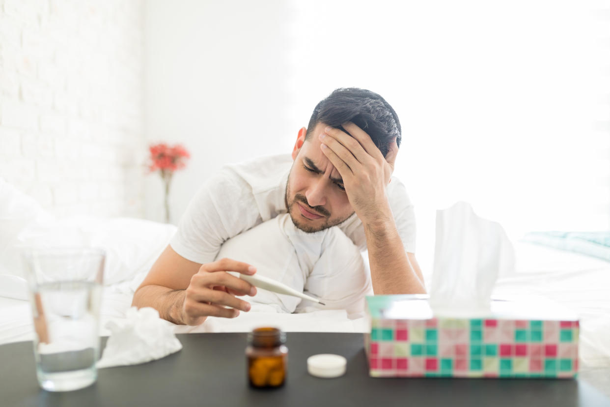 Man with flu symptoms. (Getty Images)