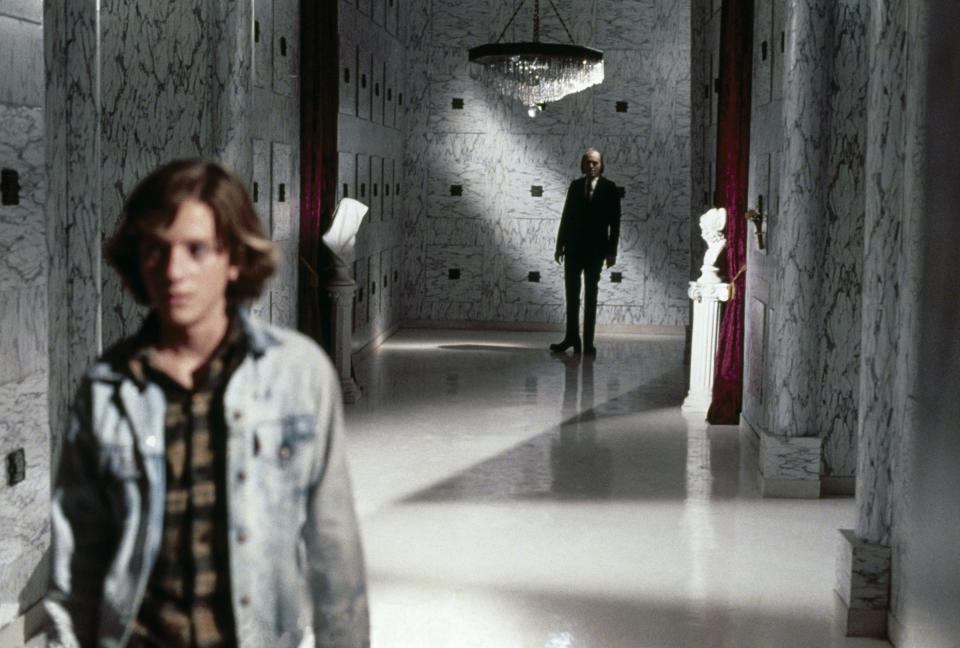 A young boy is stalked by The Tall Man in a daunting mausoleum in "Phantasm"