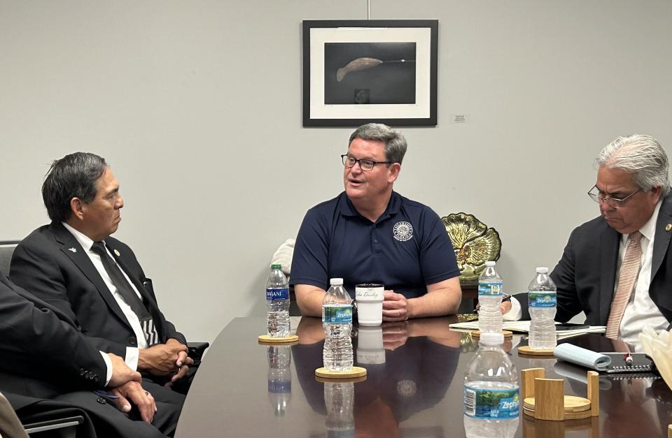 Mayor John Dailey, center, speaks with Muscogee (Creek) Nation Principal Chief David hill, left, at City Hall in Tallahassee on Wednesday, May 15, 2024.