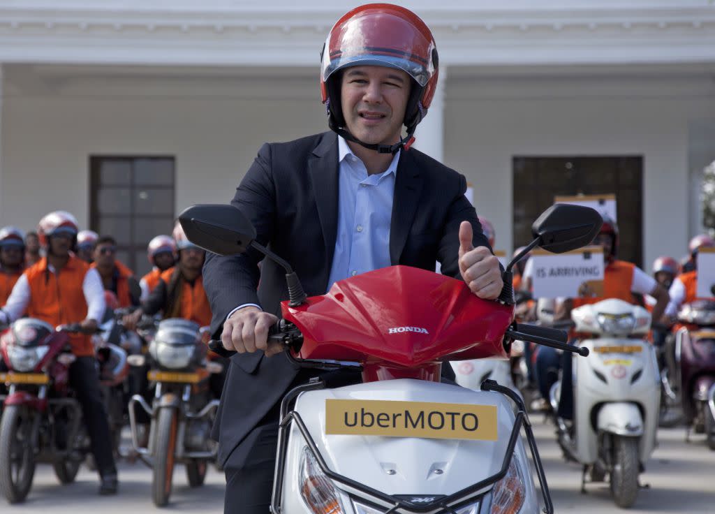 Uber CEO Travis Kalanick, poses during the launch of its bike-sharing product, uberMOTO, in Hyderabad, India, Tuesday, Dec. 13, 2016.
