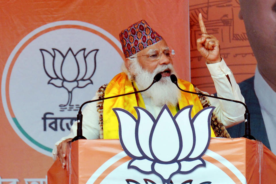 Image: Indian Prime Minister Narendra Modi gestures as he speaks in a rally in West Bengal's assembly election on April 10. (Diptendu Dutta / AFP - Getty Images)