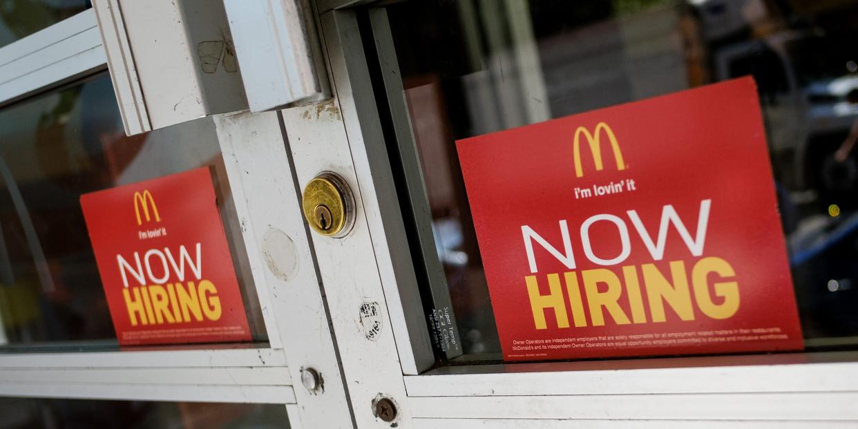 McDonald's entrance with "now hiring" sticker