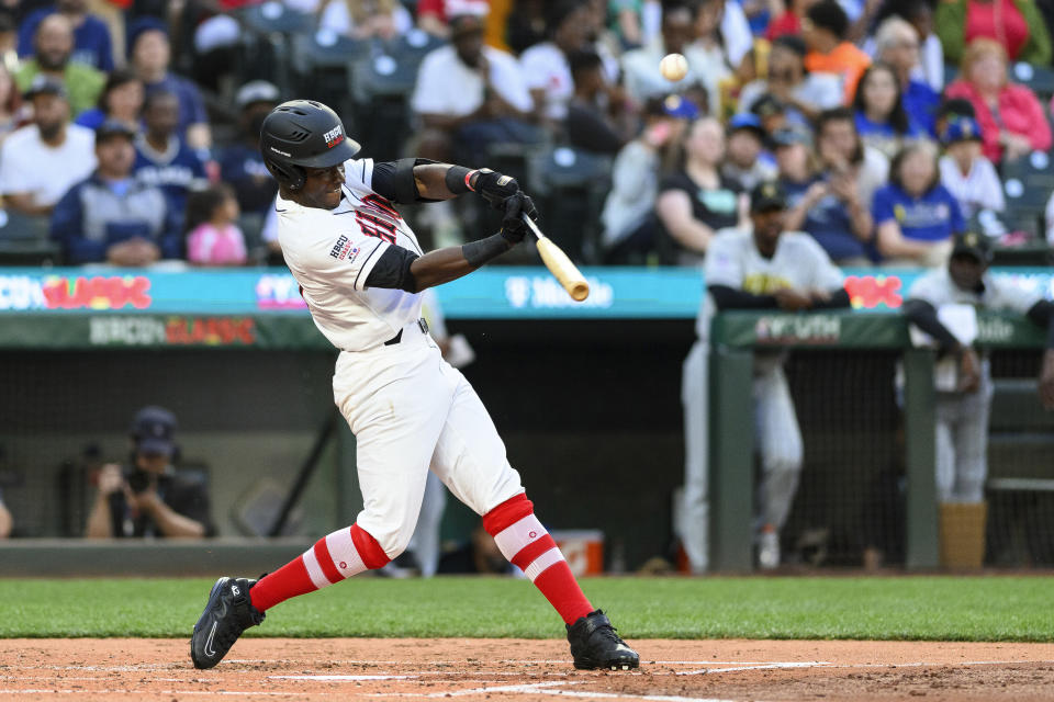 Bethune-Cookman's Hylan Hall flies out to center field during the third inning of the HBCU Swingman Classic baseball game during All-Star Week, Friday, July 7, 2023, in Seattle. (AP Photo/Caean Couto)