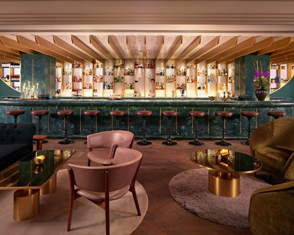 <p>Located on London’s River Thames, Dandelyan is a popular bar with locals and visitors. The bar’s green and millennial pink decor makes it the ideal pit-stop for the perfect Instagram snap.<br>Open for high tea, cocktails and bites, the cosy bar is fit for any occasion.<br>Source: Instagram @mondrianldn </p>