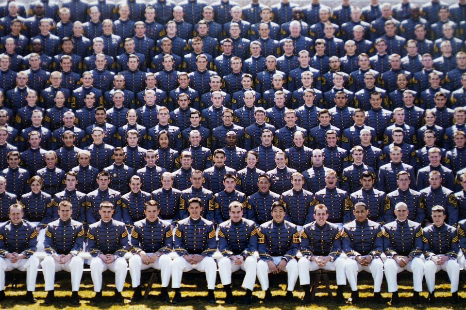 Carlton Shelley II, center, is seen in this photo of the graduating class of 2013 at the U.S. Military Academy at West Point, N.Y. Shelley was recruited to play football for West Point from his Sarasota, Fla., high school and entered the academy in 2009. (U.S. Military Academy via AP)