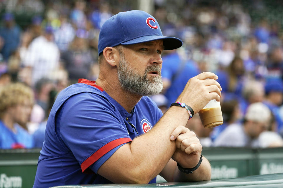 Chicago Cubs manager David Ross looks to the field before the first baseball game of a doubleheader against the New York Mets in Chicago, Saturday, July 16, 2022. (AP Photo/Nam Y. Huh)