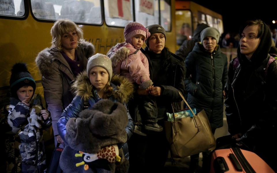 Internally displaced people from Mariupol and nearby towns arrive in Zaporizhzhia, Ukraine, Friday, April 1, 2022. (AP Photo/Felipe Dana)  - Felipe Dana/AP