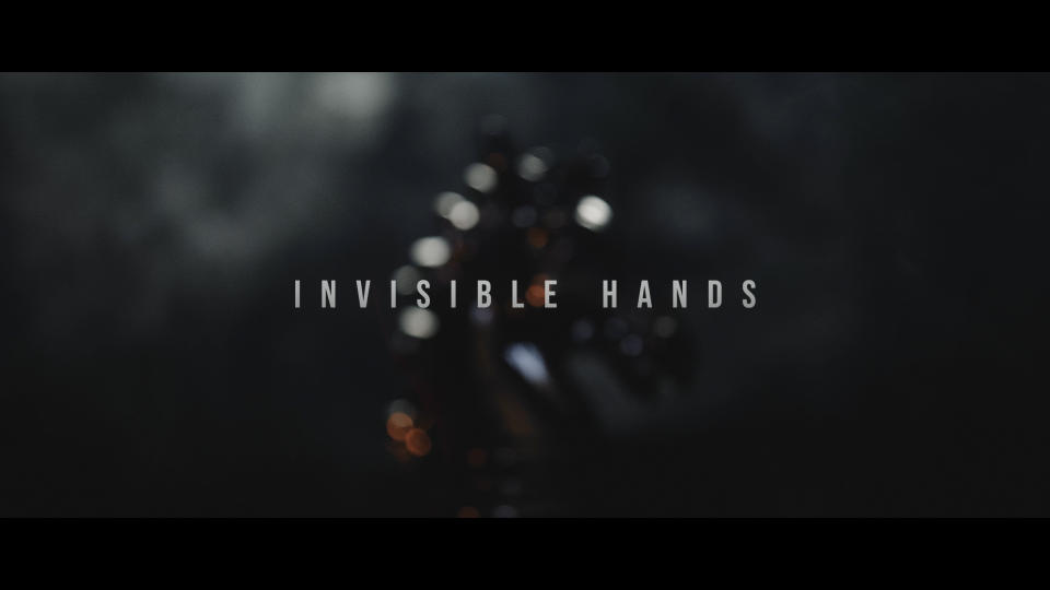 This image from video released by the U.S. Army, shows a frame from a haunting new video, released on May 2, 2024, in the latest effort by the Army to lure soldiers to some of its more secretive units. Hints of its origin are tucked into the frames as they flash by touting the power of words, ideas and "invisible hands." Army Special Operations Command hopes that those drawn to the video may be interested in joining as one of its psychological warfare soldiers. (U.S. Army via AP)