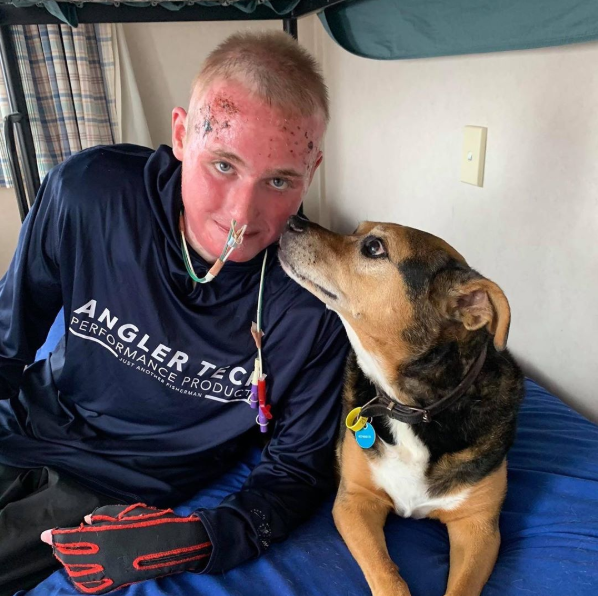 Jake Millbank was allowed out of hospital to see his dog for the first time in three months. Source: Instagram/jake_milbank