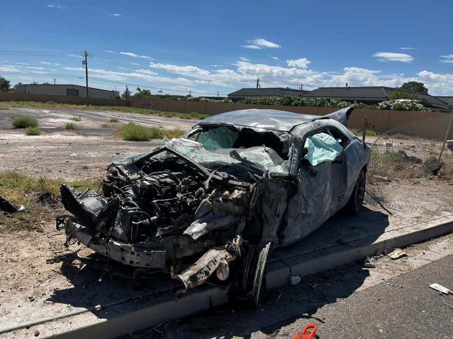 The wreckage of a Dodge Challenger that crashed during a street race on Jones Boulevard, north of Sahara Avenue.  (Las Vegas Metropolitan Police Department)