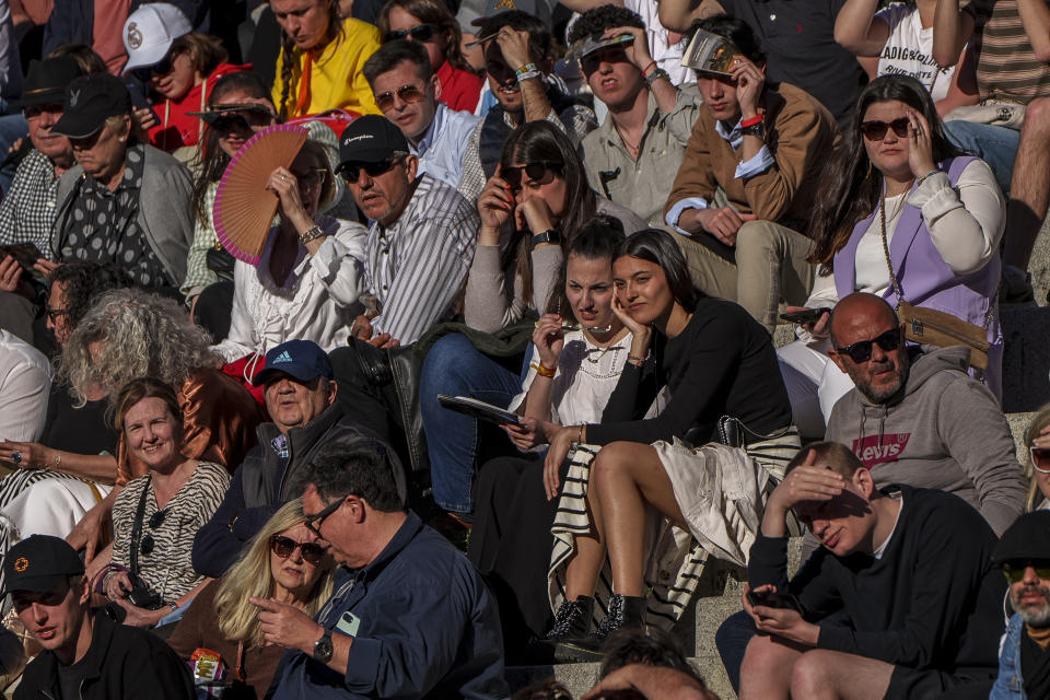 Spectators watch a bullfight with young bulls at Las Ventas bullring in Madrid, Spain, Sunday, March 26, 2023. Those aged over 75 were the least likely to attend. While bullfighting is nowhere close to drawing the crowds of half a century ago, it remains an important, if divisive, symbol of Spanish identity in the country's south and central regions. (AP Photo/Manu Fernandez)