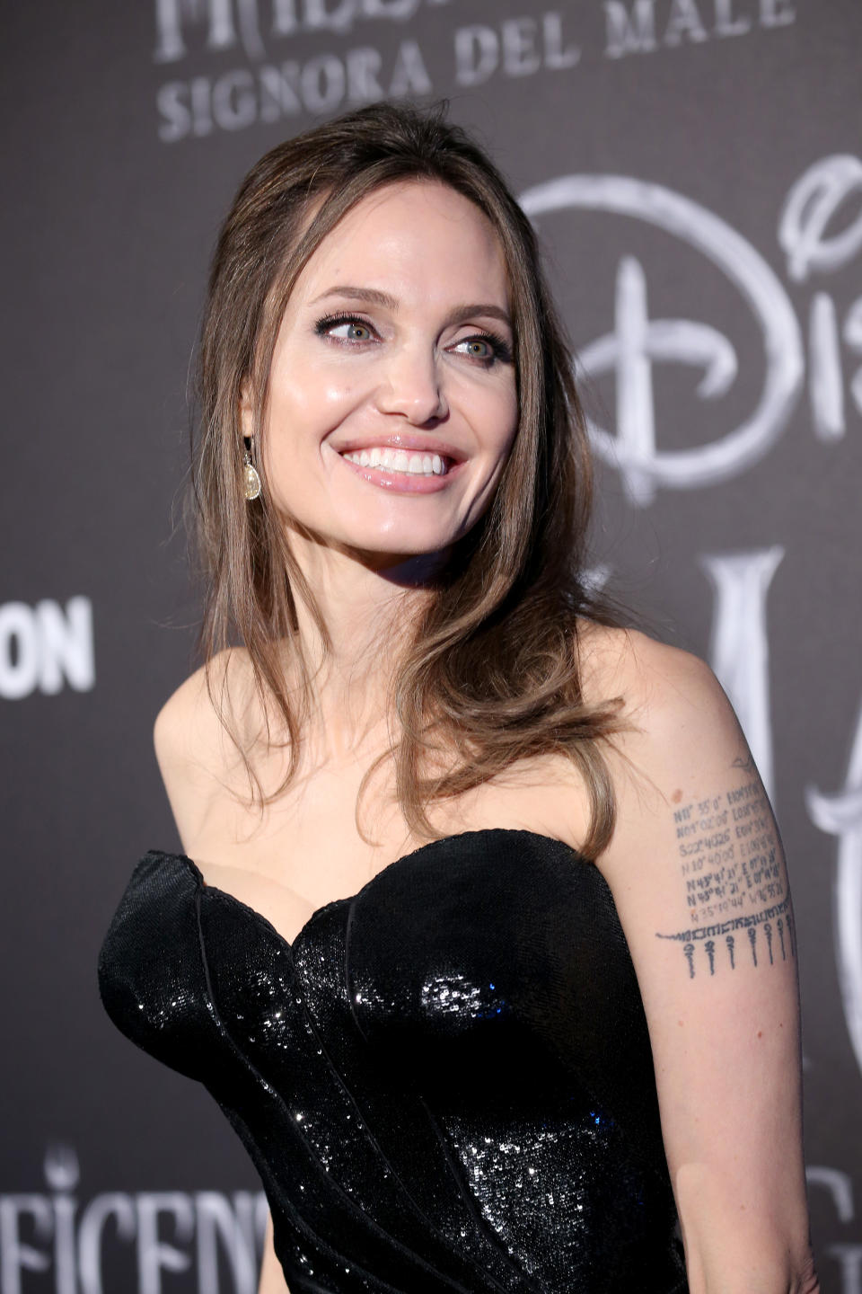 Angelina Jolie, wearing custom Versace, at the 'Maleficent' premiere in Rome [Photo: Getty]