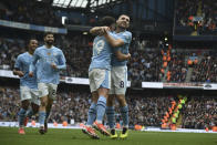 Manchester City's Mateo Kovacic, right, celebrates with teammates after scoring his side's second goal during the English Premier League soccer match between Manchester City and Luton Town at Etihad stadium in Manchester, England, Saturday, April 13, 2024. (AP Photo/Rui Vieira)
