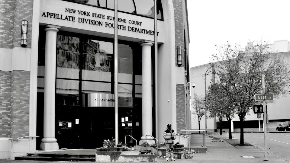 Anthony Miller stands in front of the  Appellate Division, Fourth Department.