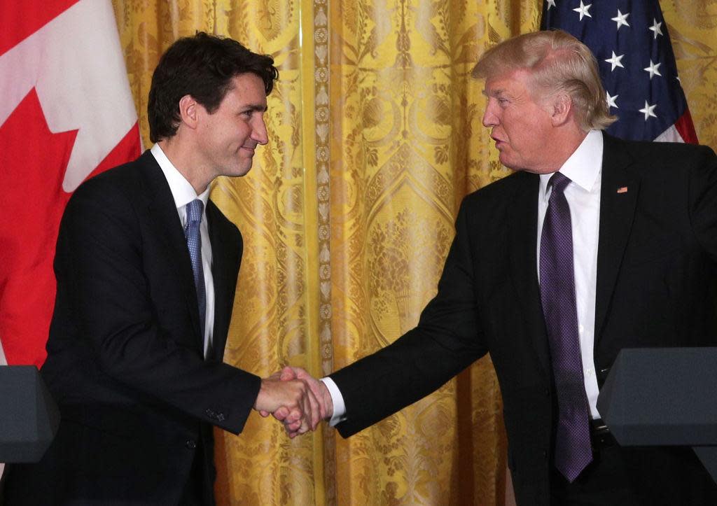 An example of Mr Trump's rather aggressive handshake