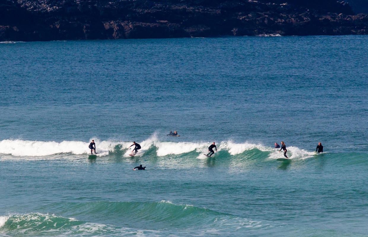  See SWNS story SWPLsurf. Despite surfing been banned  in Itlay, Spain and France the water sport hasn't been explicitly restricted in the UK. Government guidance is that people shouldn't be driving to do their daily excercise so if surfers can walk to the beach that could be allowable under current UK lockdown rules 